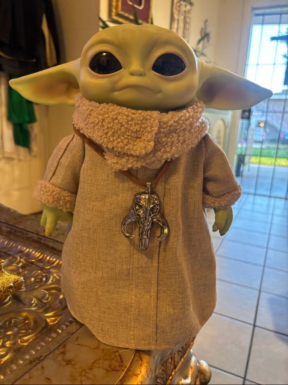 The Child Plush Figure in Beige Coat with Brown Accents - Collectible Kids Toy